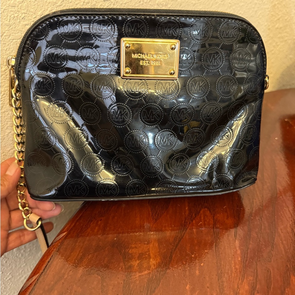 Michael Kors Glossy Black Crossbody Bag with Gold Accents